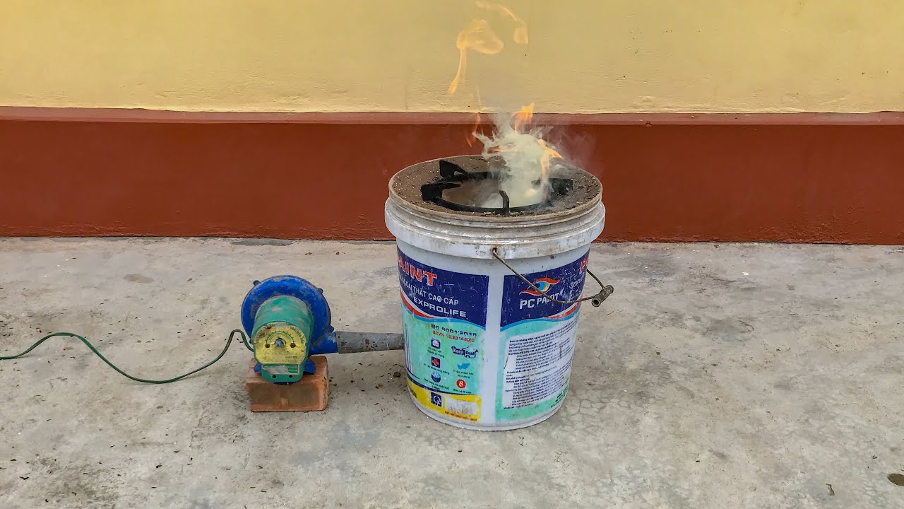 Make rice husk stove with earth and plastic bucket