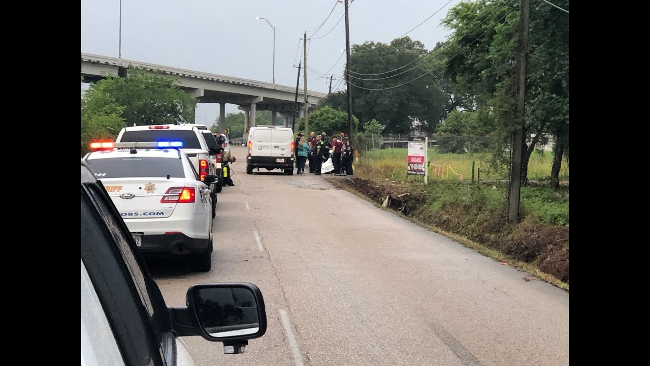 Woman killed in crash after car lands in bayou