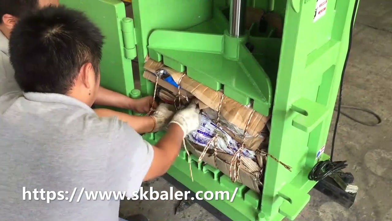 Low-cost economy cardboard baler in China, hydraulic carton baling machine, vertical baler machine.