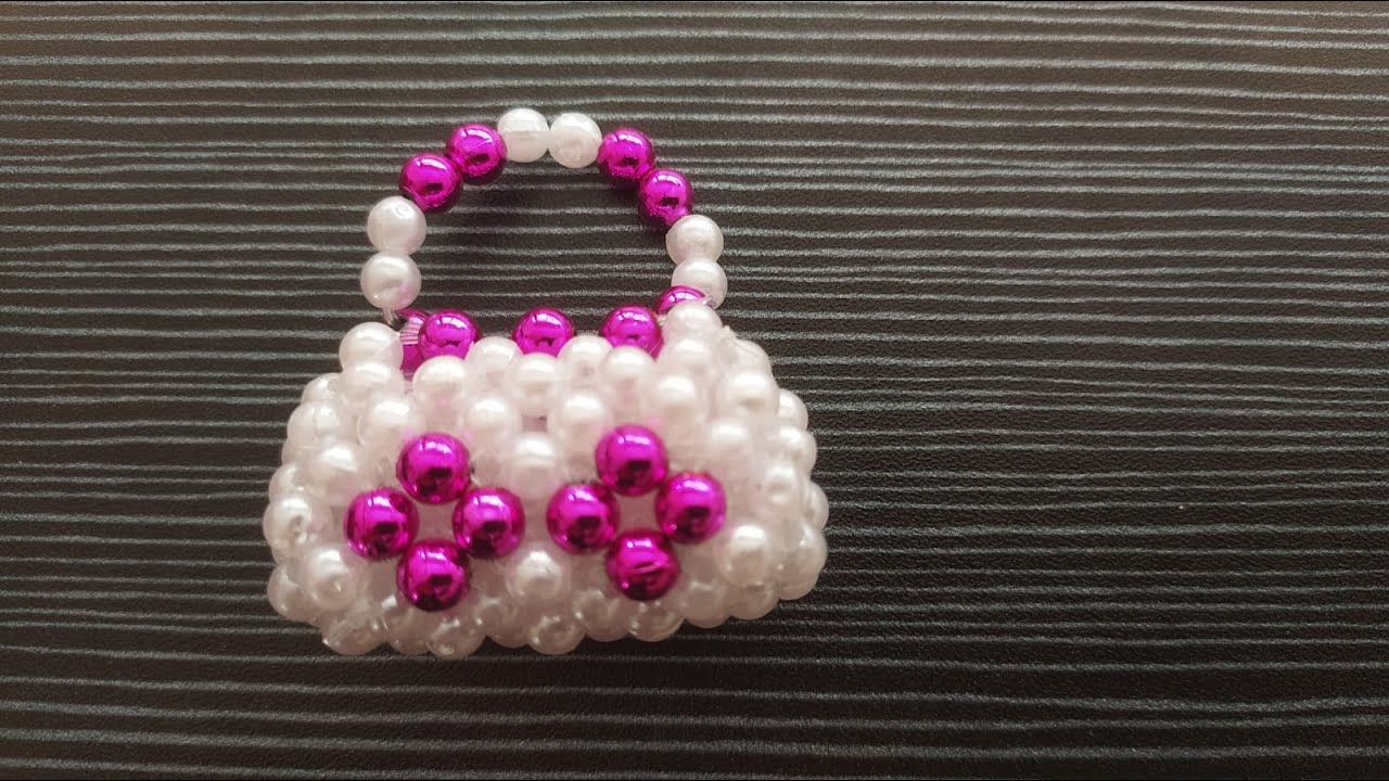How to make Beaded Purse | मोत्याने विणलेली Purse #DIY #....