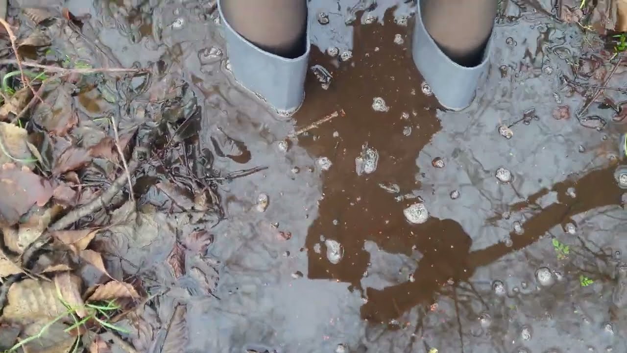 Grey High Heel Rubber Boots in Mud 1