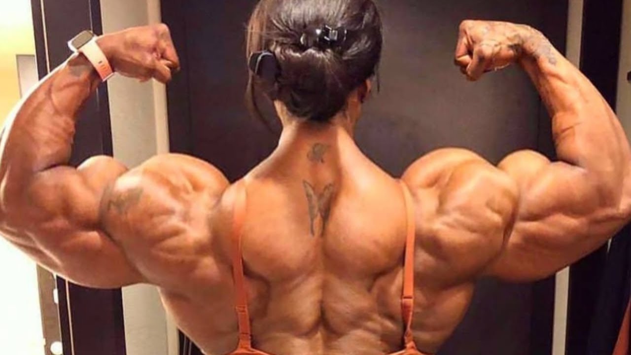 FEMALE BODYBUILDER WITH BIG BICEPS