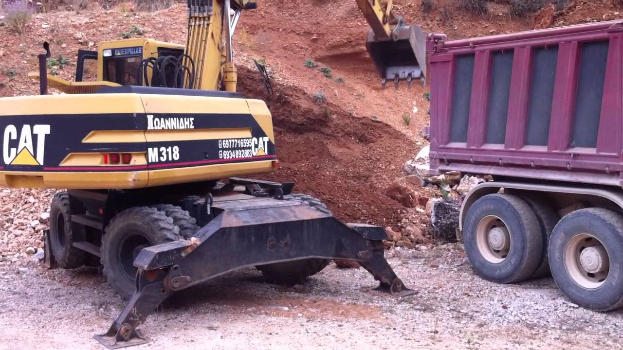 CAT  M318