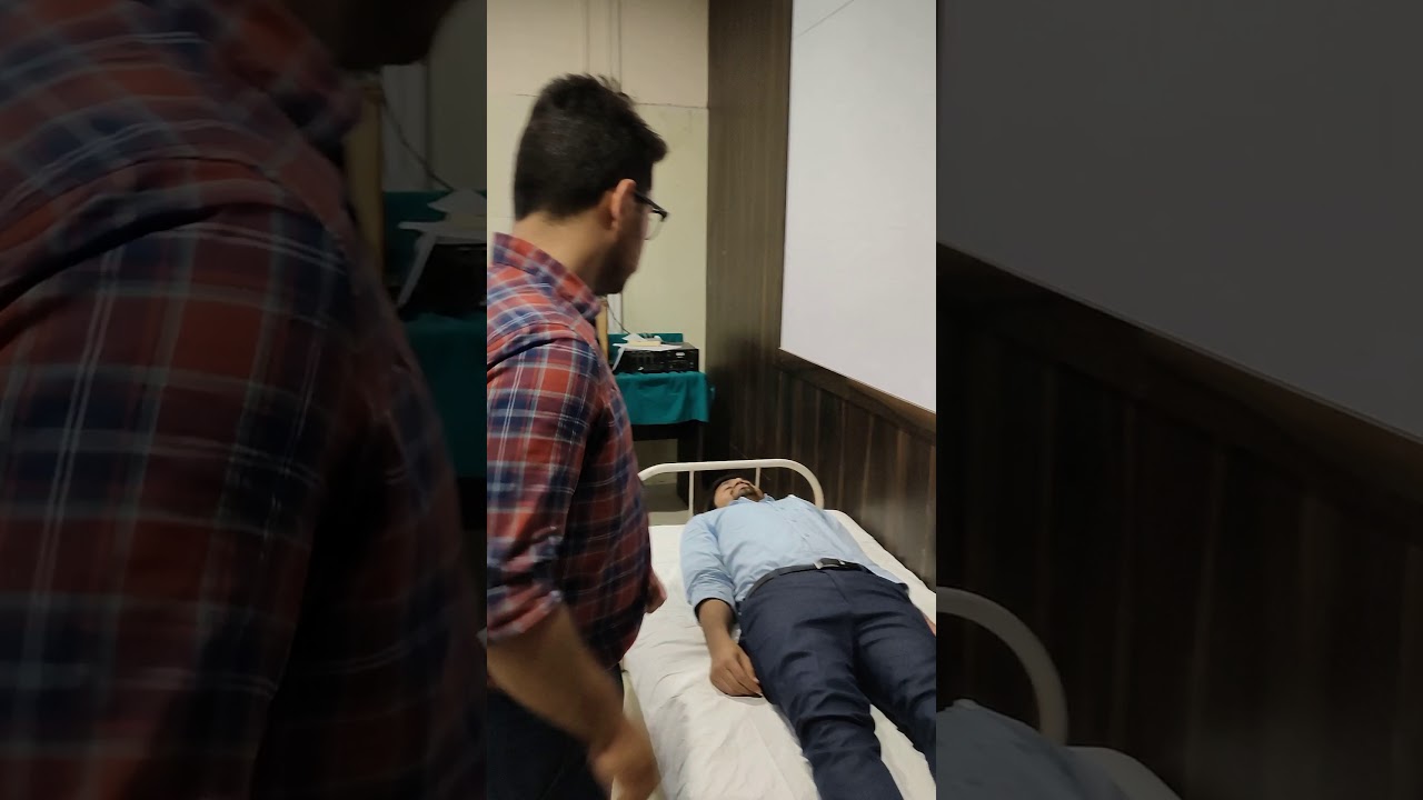 Demonstration of Heel-Knee-Shin Test in a case suffering from Cerebellar Ataxia, Dept. of Med., JNMC