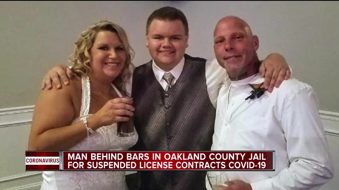 Man behind bars in Oakland County jail for suspended license contracts COVID-19