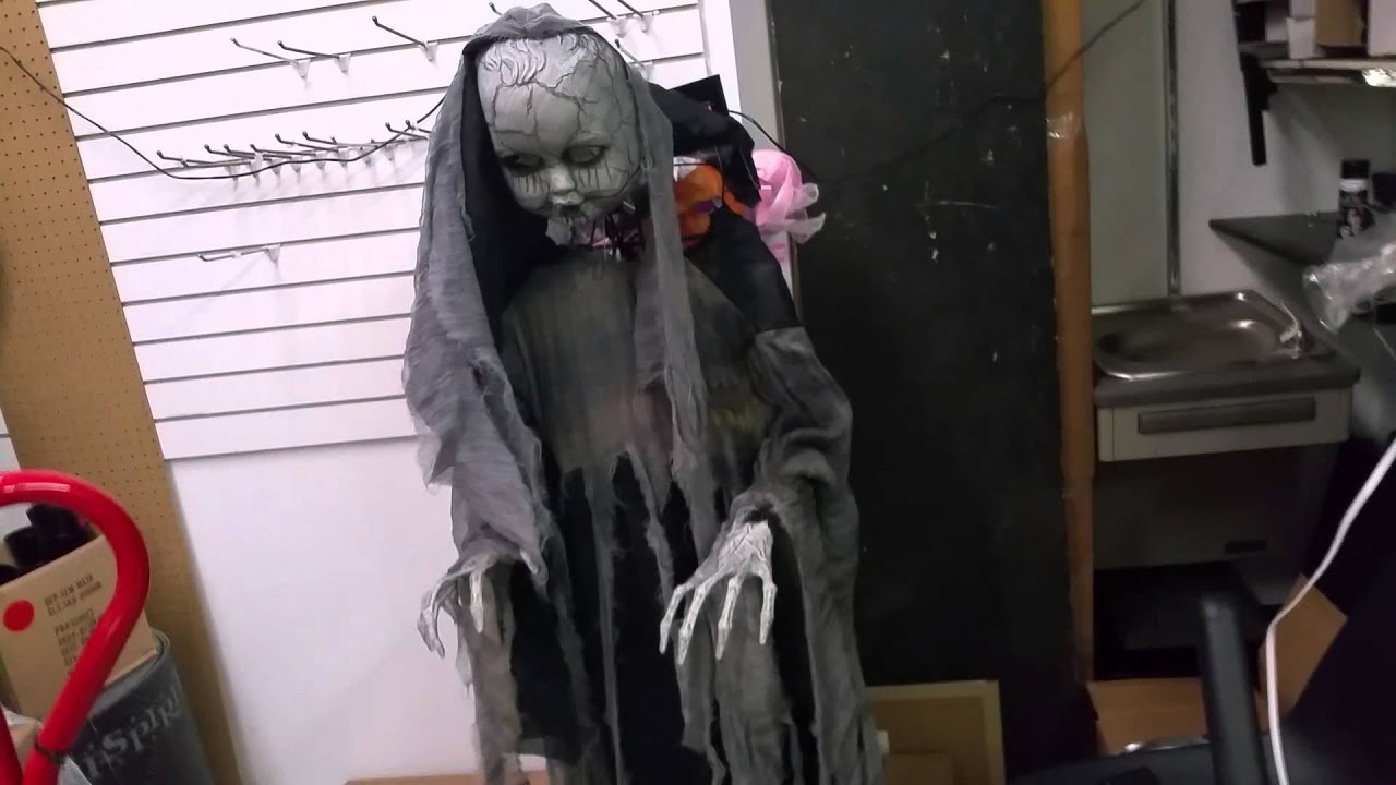 Spirit halloween rising doll defective