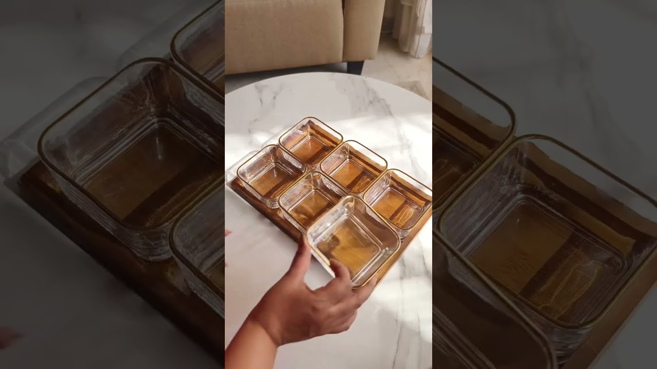 Snacks serving tray with glass bowls and beautiful lids and a bamboo base tray  #homeessentials