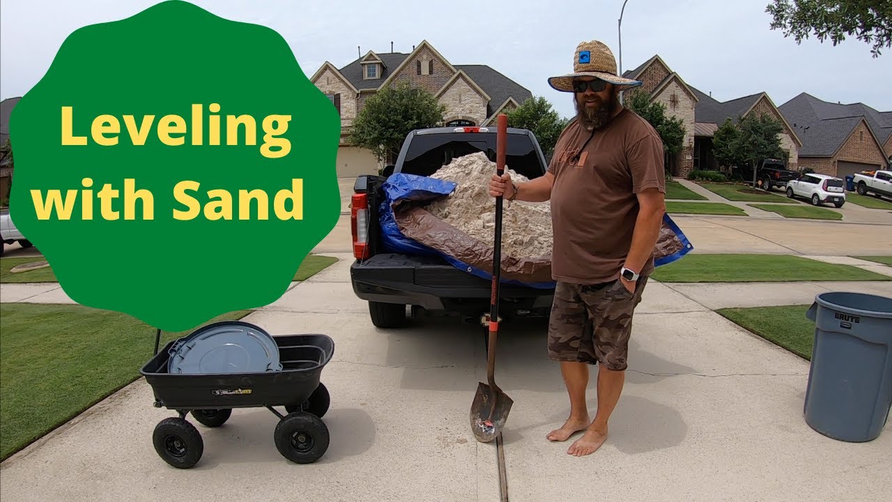 Top dressing my Bermuda and leveling with sand and a drag mat.