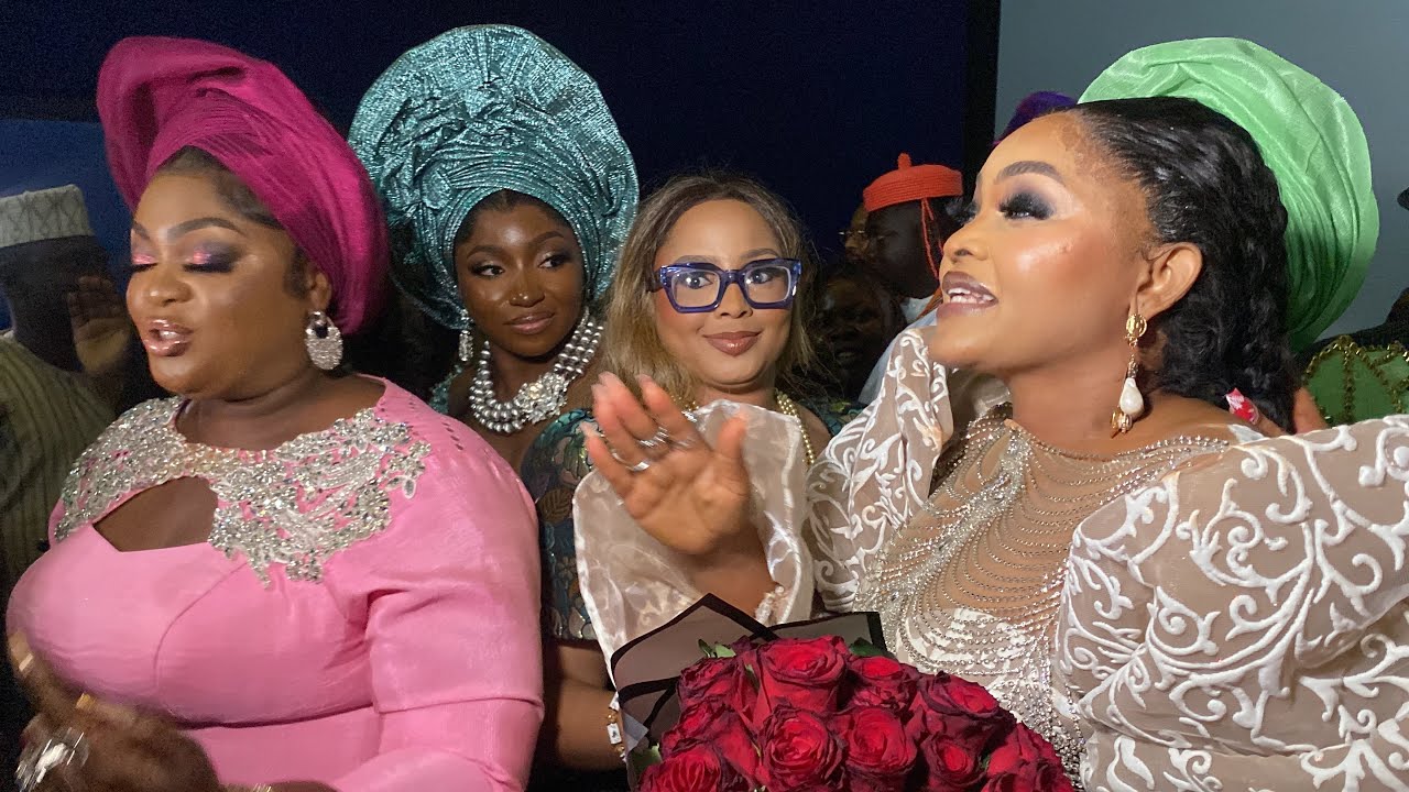 SEYI EDUN HUGS MERCY AIGBE, ENIOLA BADMUS AND FAITHIA BALOGUN AT THE PREMIERE OF ADA OMO DADDY