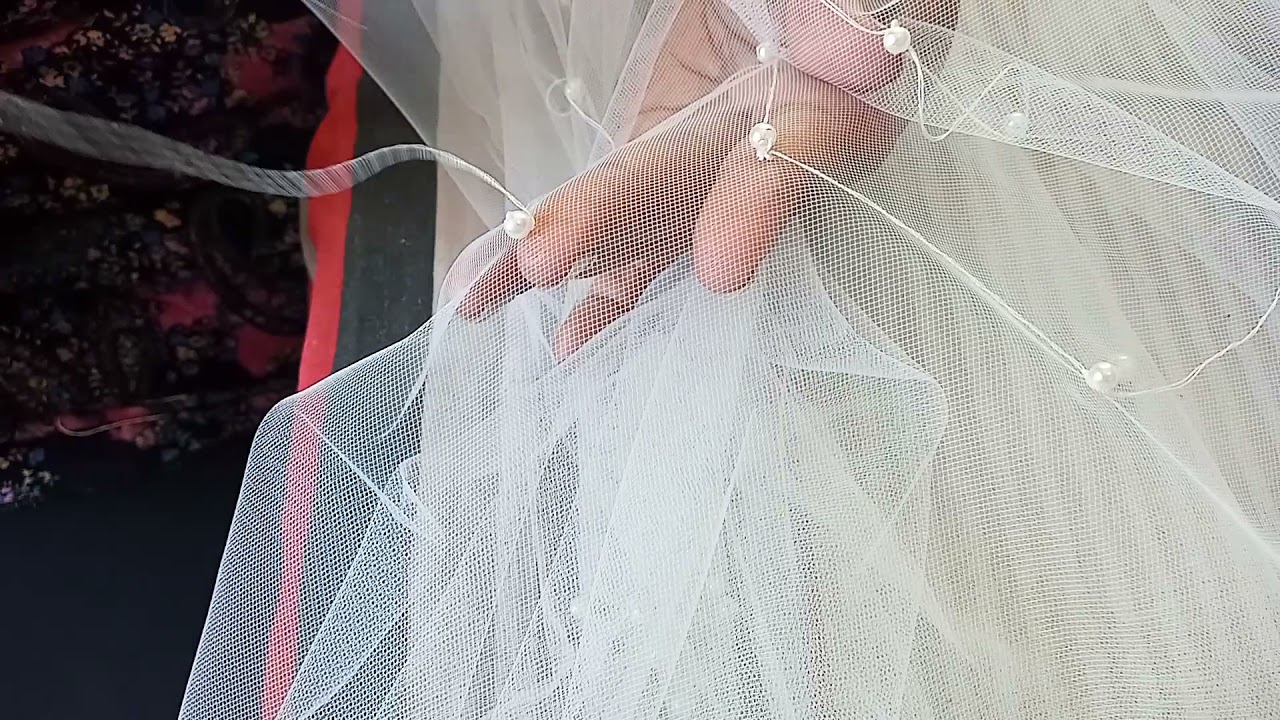 como coser perlas en tul