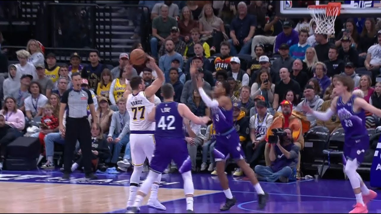Luka Doncic with the pump fake, over the head no-look pass to Marcus Smart for the 3-pointer