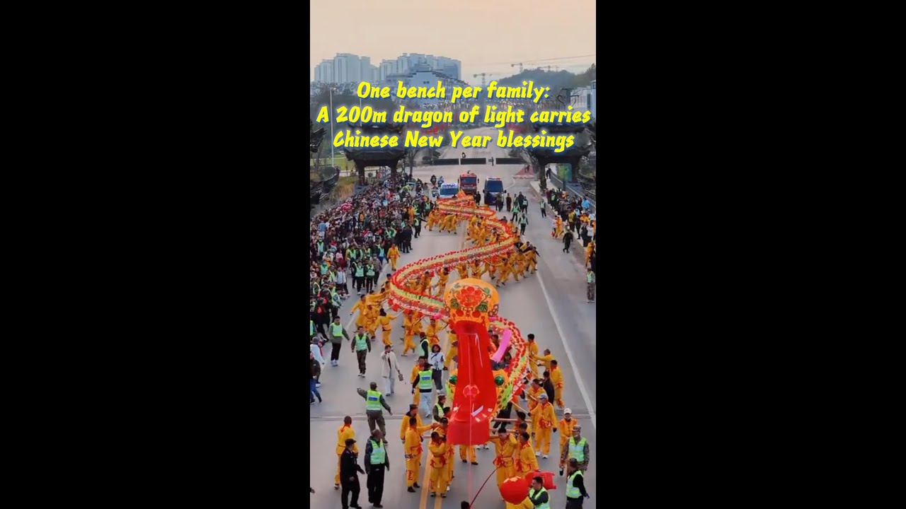 One bench per family: A 200m dragon of light carries Chinese New Year blessings