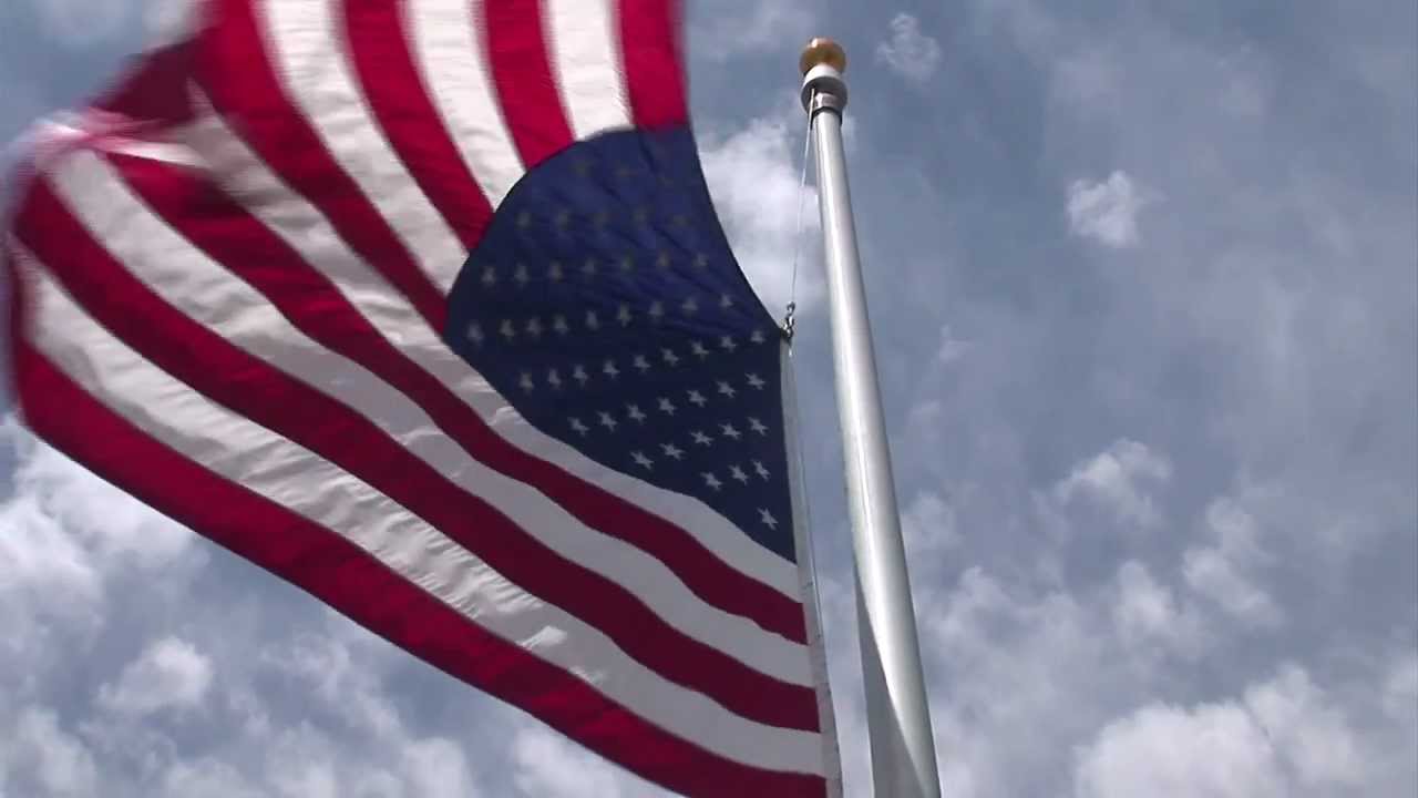 See Repairs by a Flagpole Climber