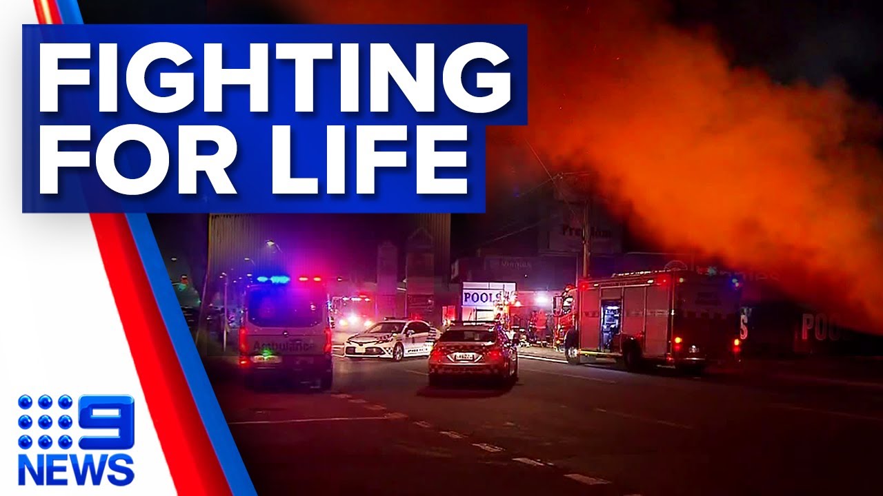 Two firefighters in hospital, one fighting for life after Queensland fire | 9 News Australia