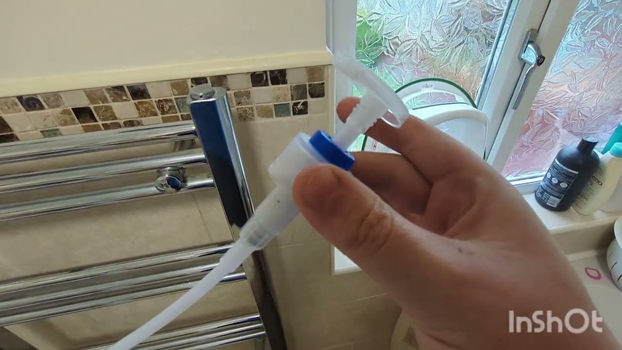 Add inhibitor to central heating system via a Towel Rail - drain using a soap pump!