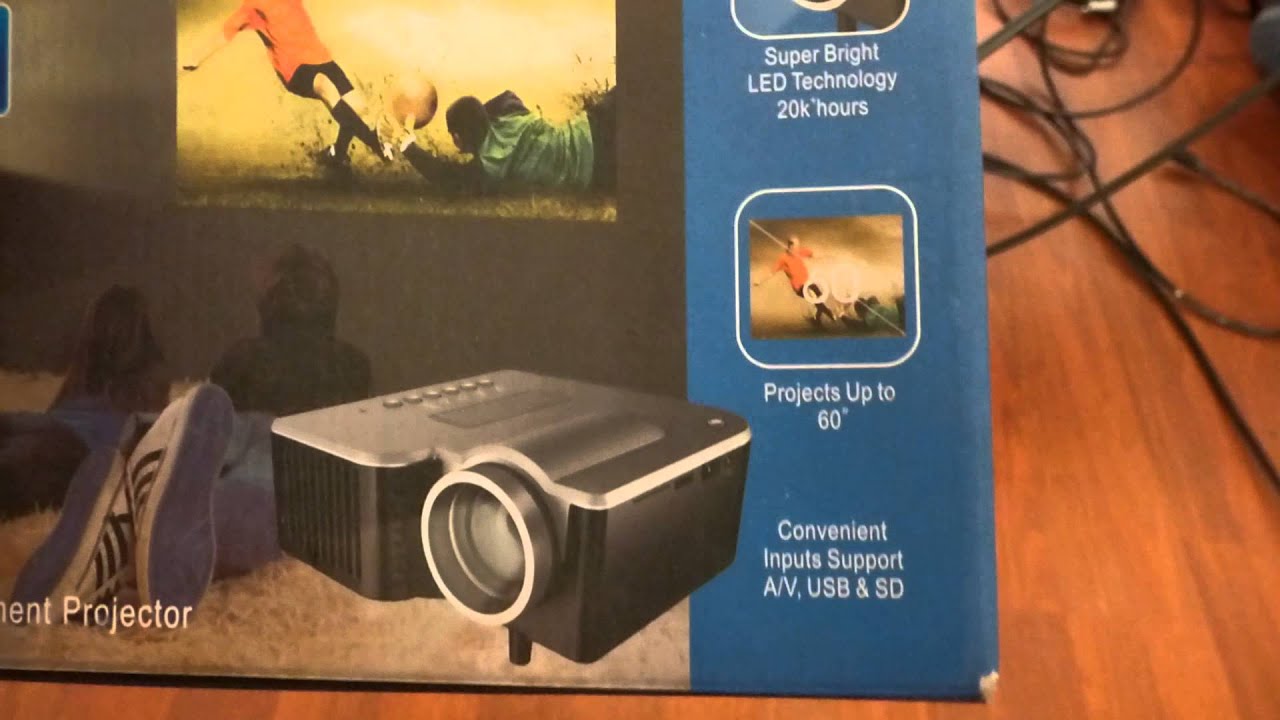48 LUMENS PROJECTOR, FULLY LIT ROOM 7FT BACK ON CRYSTAL EDGE TECHNOLOGY SCREENS