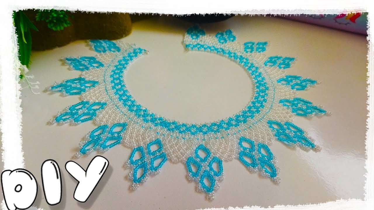 DELICATE NECKLACE made of BLUE and TRANSPARENT BEADS