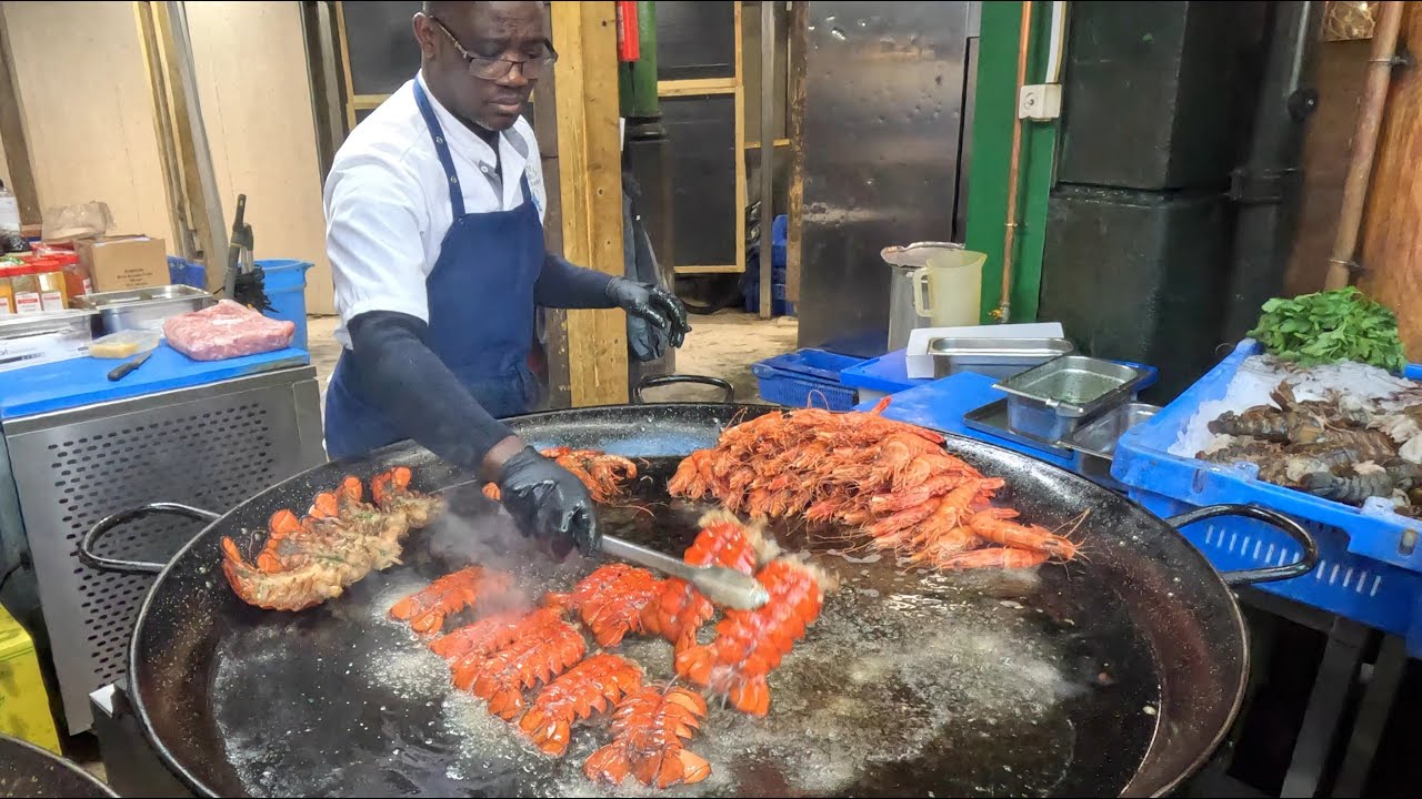 Very Big Seafood Paellas. Lobsters and Shrimps. London Street Food