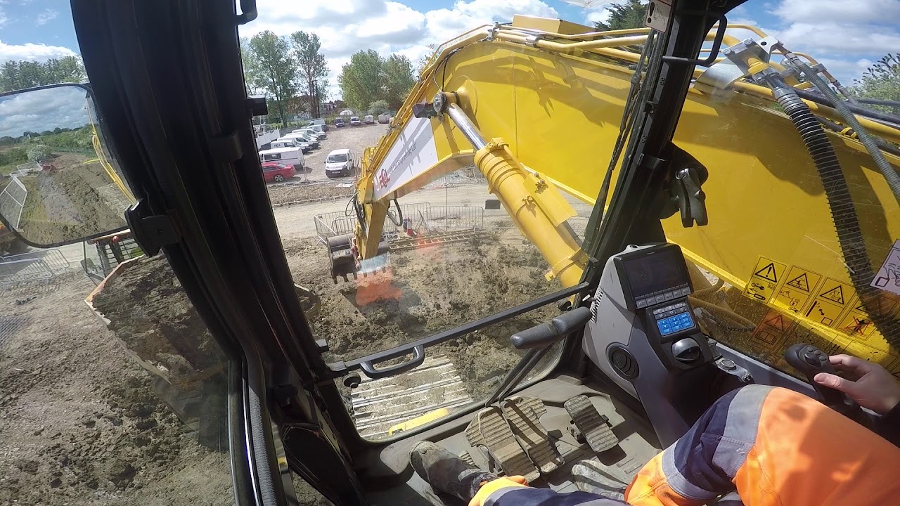 Komatsu 210LCI excavator loading a dumper