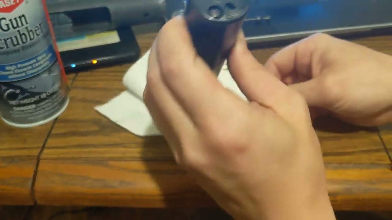 fixing the tec-9 jam.