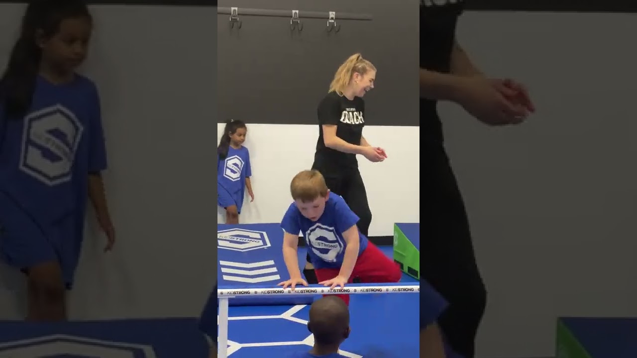 Kid strong front roll