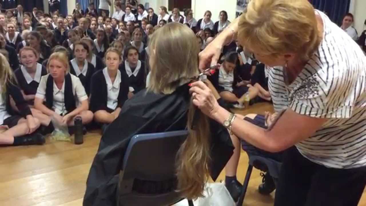 Getting a hair cut for World's Greatest Shave at school