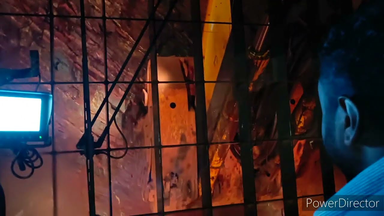 IRON ORE MINING AT MIDNIGHT AND OPERATION OF HEAVY EQUIPMENT MACHINE, OPEN CAST MINING AT NIGHT