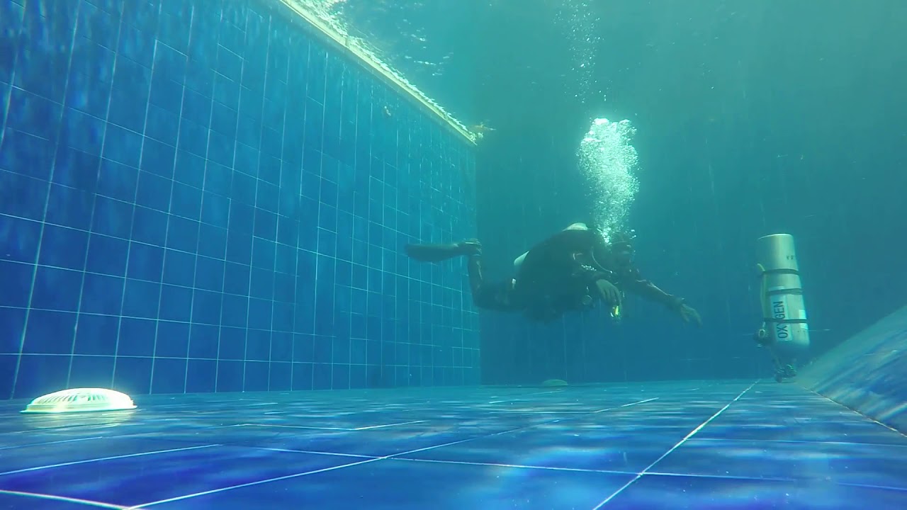 Technical diving skills- stage and retrieve practice, with drygloves