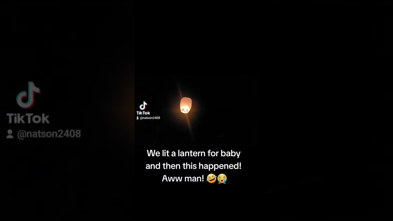 floating lantern fail.We thought it was going to clear the power lines, then bam, the wind hit it 😳