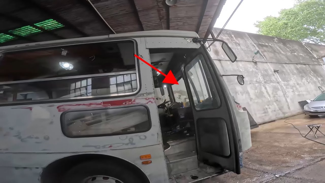 puerta pantografica de ómnibus viejo  conversión a motorhome