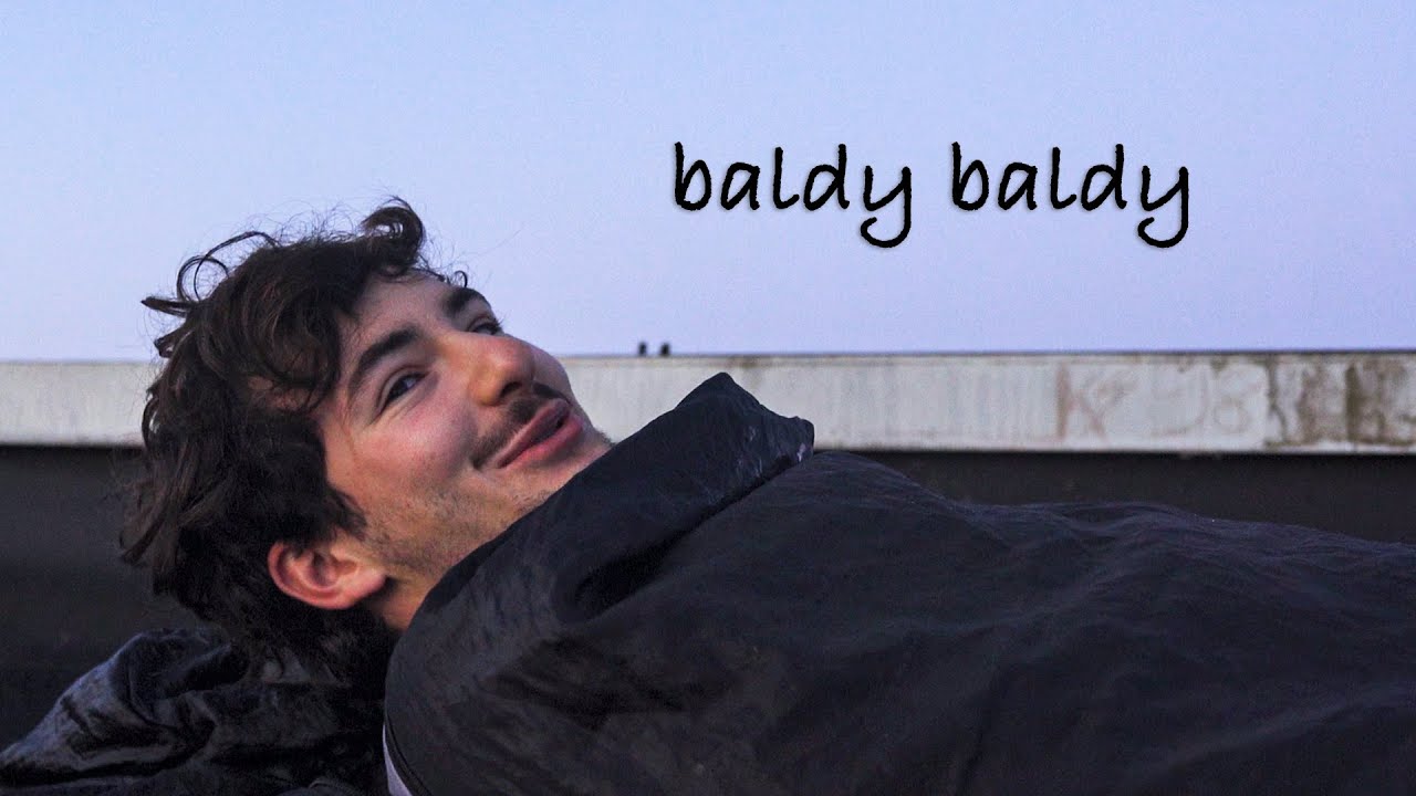 baldy baldy over there