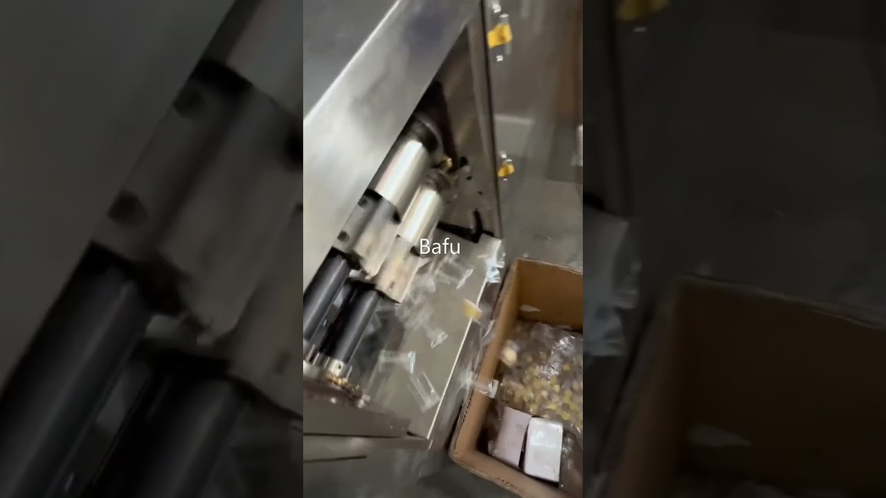 candy wrapping machine, high speed flow wrapper, candy packaging machine, automatic packing machine