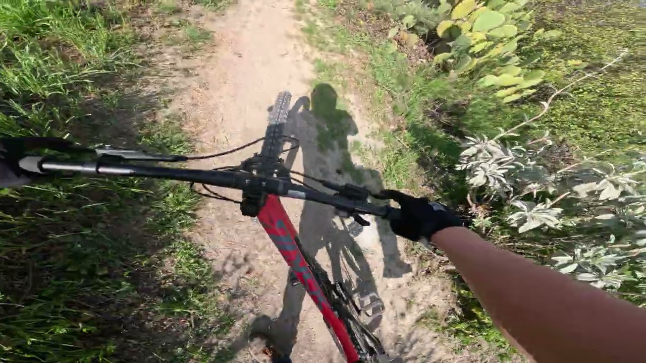 Riding a steep trail with tight turns 