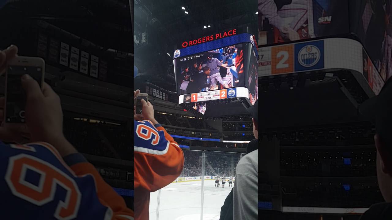 Edmonton Oilers fans react to Blue Jay's wild card win during oilers game