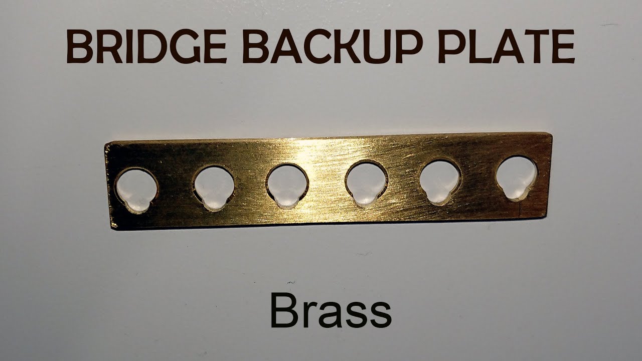 Guitar bridge backup plate