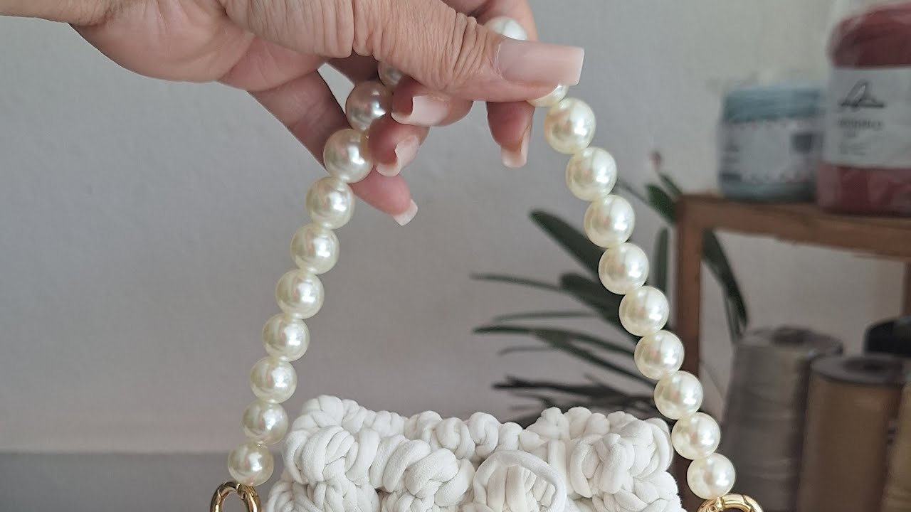 alça  de pérolas para bolsa de mão.👛