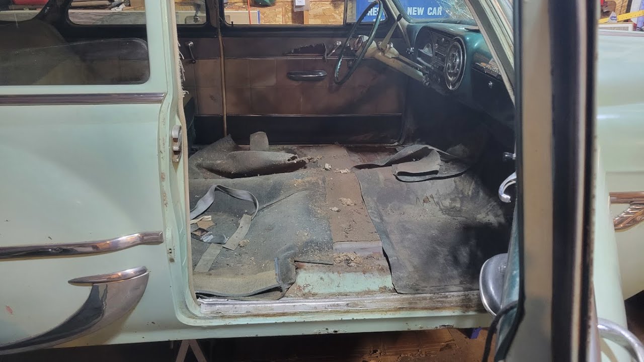 Checking The Floors On The 1953 Pontiac