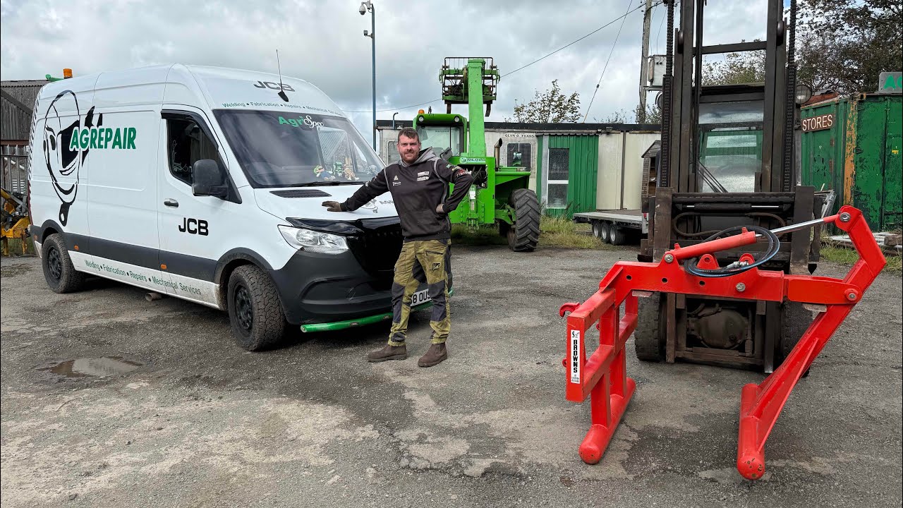 Welding brackets onto a bale grab