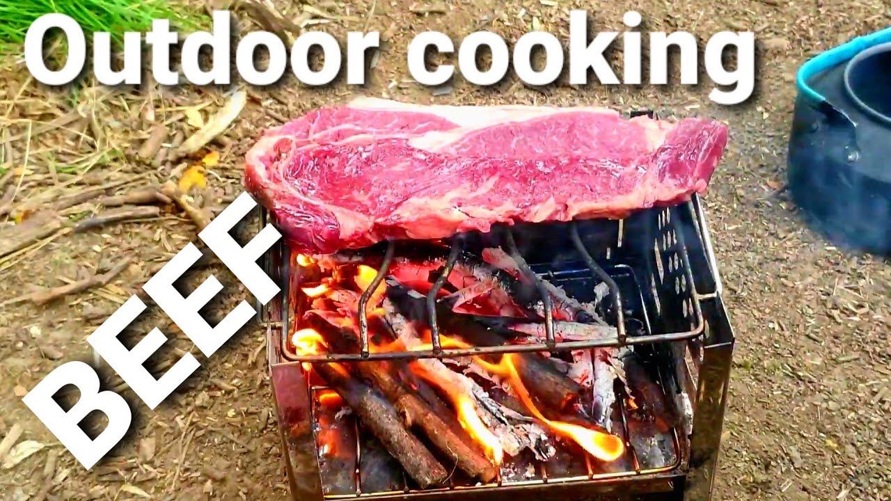 camping stove cooking two massive pieces of British beef steaks on my cheap £18 lixada stove.