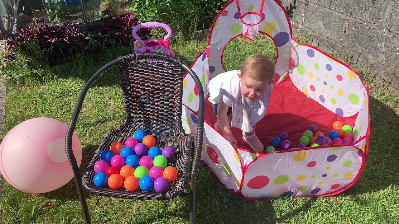Annie playing in Nana&rsquo;s garden