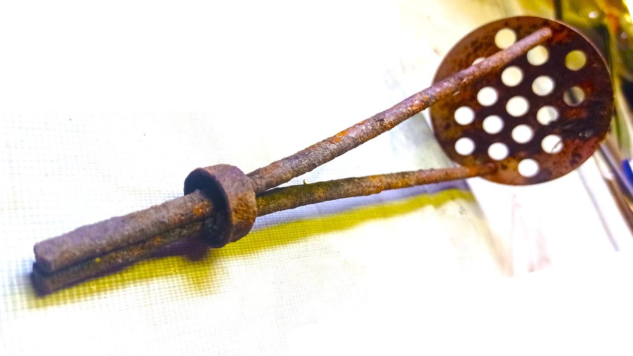 Restoration of old, rusty, burnt potato crush.