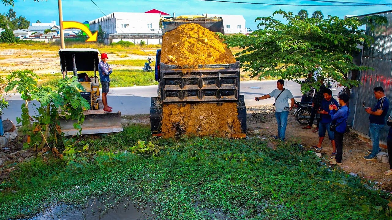 First Start New Project! Collaboration Between Bulldozer D20P and Dump Truck In Filling flooded Land