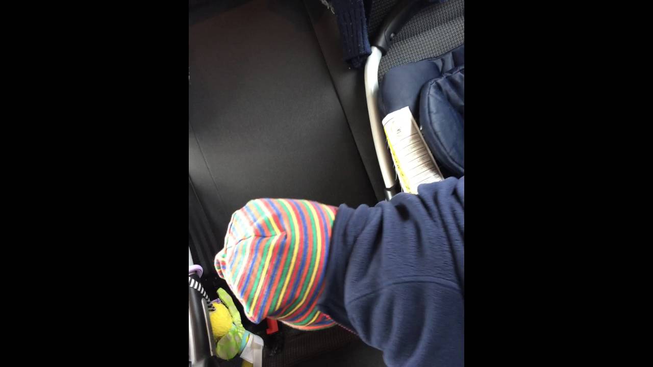 Cheeky twin entertaining his brother