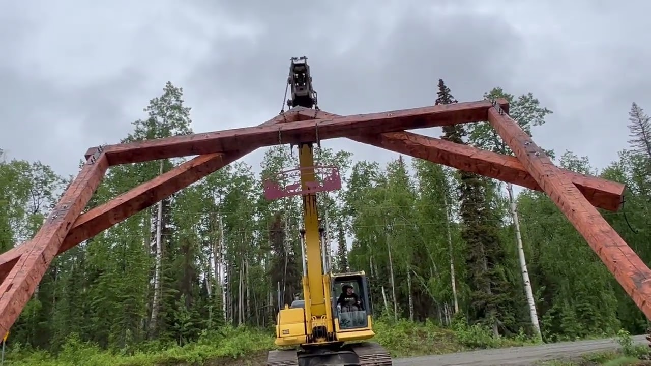 Raising the timber frame ranch gate (again)!  Lots of new concrete and steel.