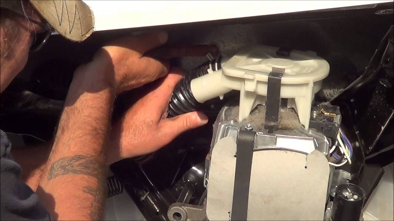 How to take motor out of a washing machine.