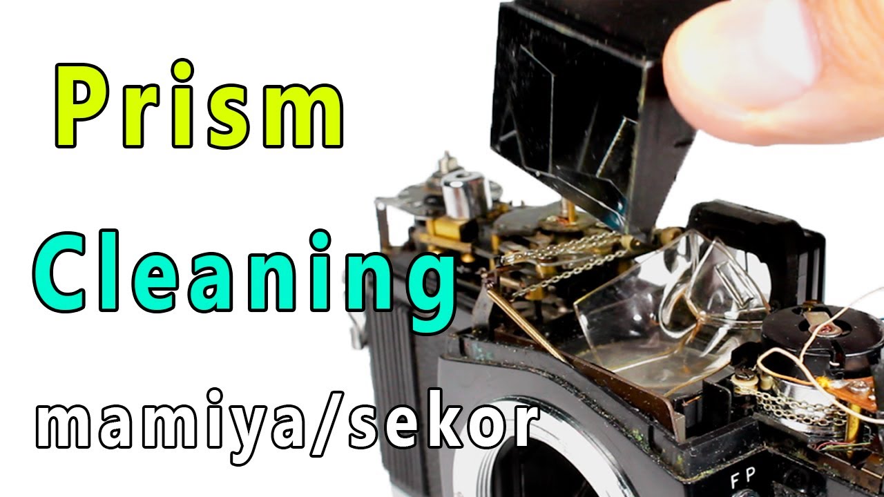 Doing Maintenance Cleaning The Viewfinder On Mamiya Sekor Camera