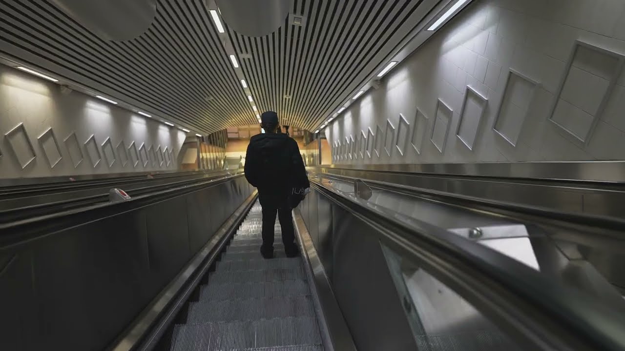 Sweden, Stockholm City Train Station, 5X escalator - going down to platform level