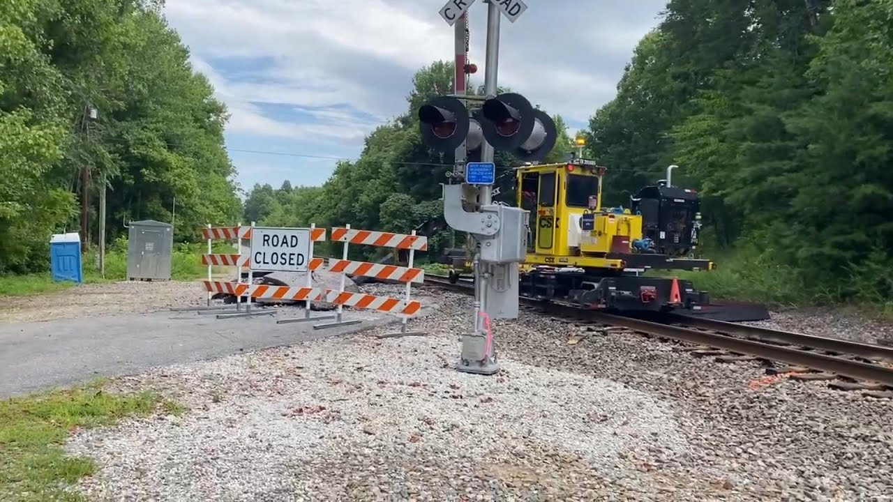 A close up look at CSX MOW track gang replacing ties, plates, spikes. Part 1