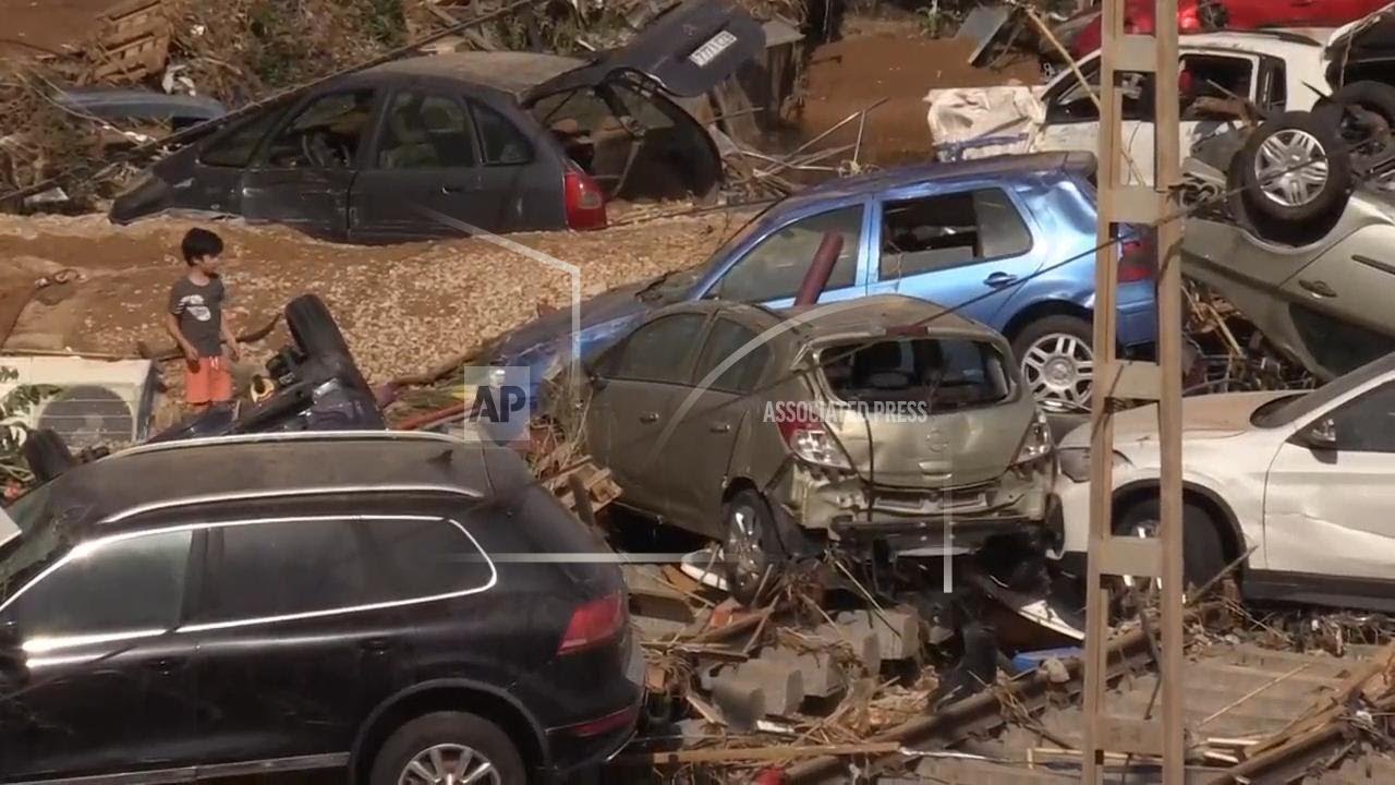Vehicles covered in mud, debris after deadly Valencia floods