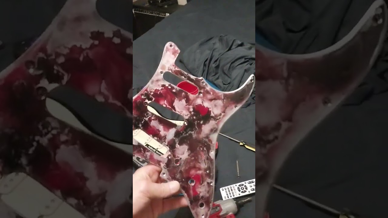my friend and I made a custom pickguard for his guitar
